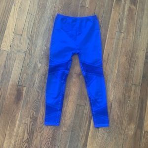 Fabletics Royal Blue High waisted capri leggings with breathable patterns!